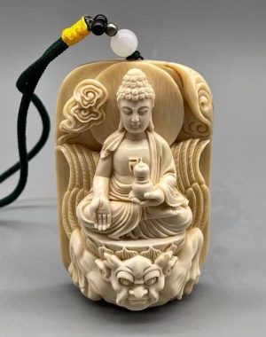 Hand-Carved Mammoth Ivory Dainichi Nyorai Pendant — Symbol of Light and Protection