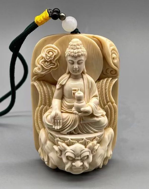 Hand-Carved Mammoth Ivory Dainichi Nyorai Pendant — Symbol of Light and Protection