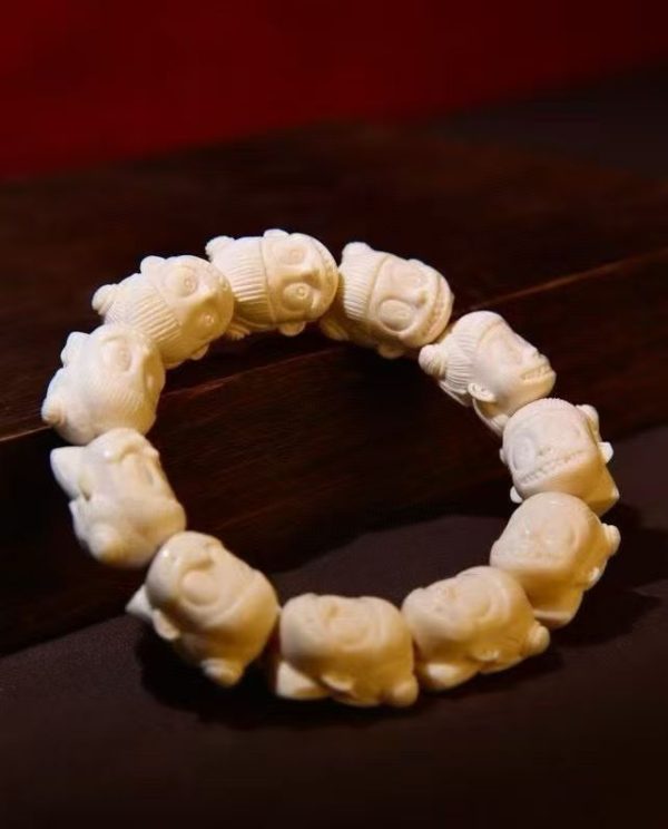 Mammoth Ivory Nezha Bracelet — Playful Artisan Carving with Charming Detail